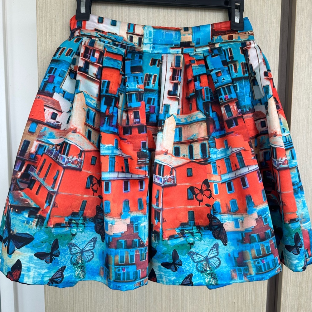 Alice & Olivia A-line pouf mini skirt. Beautiful orange and blue print